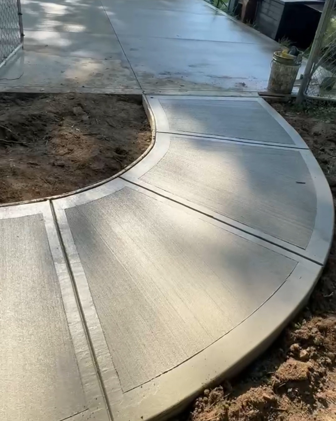 Curved concrete walkway